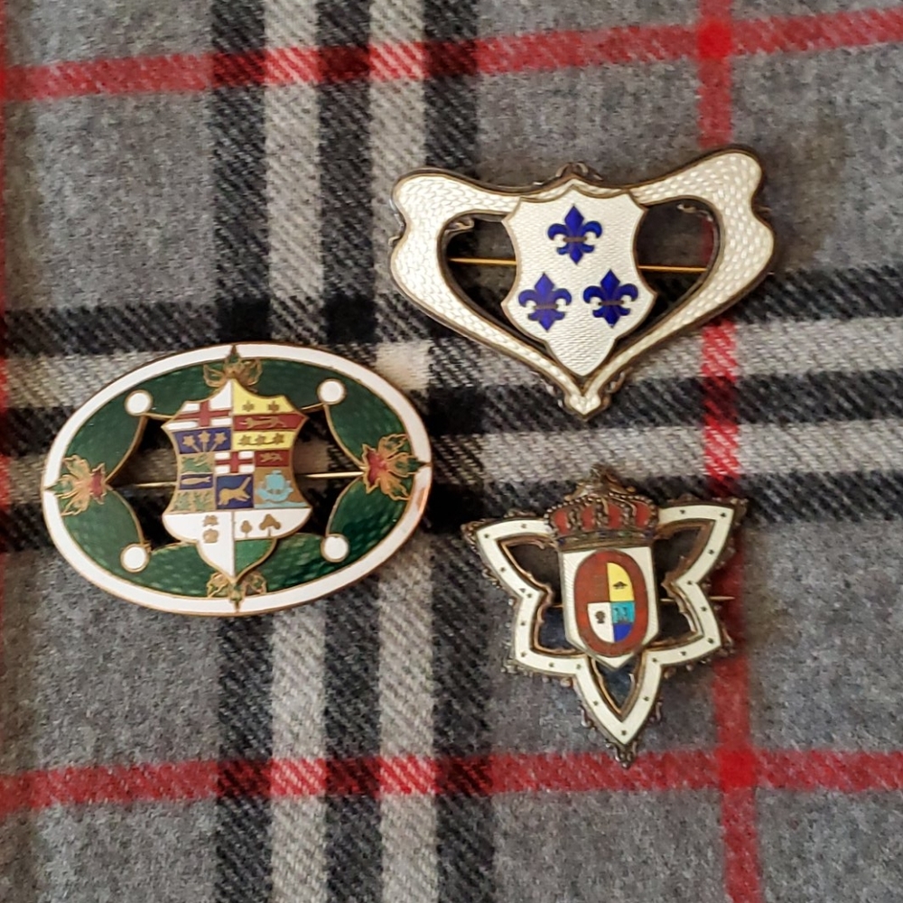 Enameled badges priced individually Be